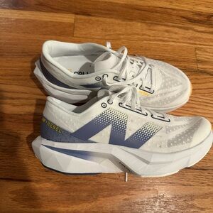 New Balance White and Blue Running Shoes